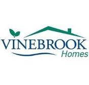 A logo for Vinebrook Homes with a house and a leaf.